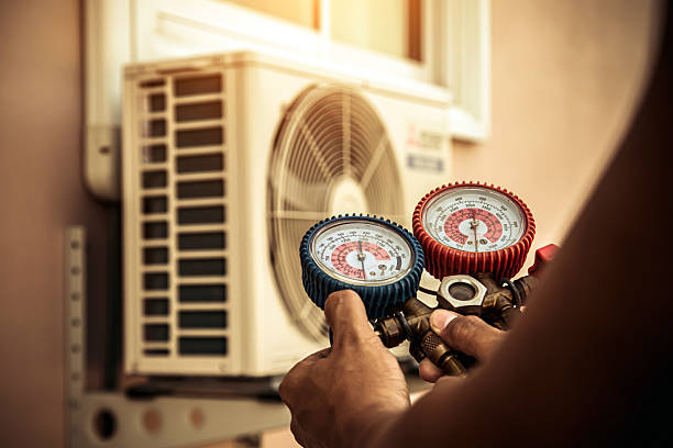 Professional Hvac Maintenance technician working in Howey-in-the-Hills, FL